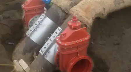 A live tap in action expanding an existing pipeline system.