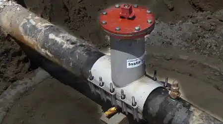 A valve insertion installed on an underground water pipeline.