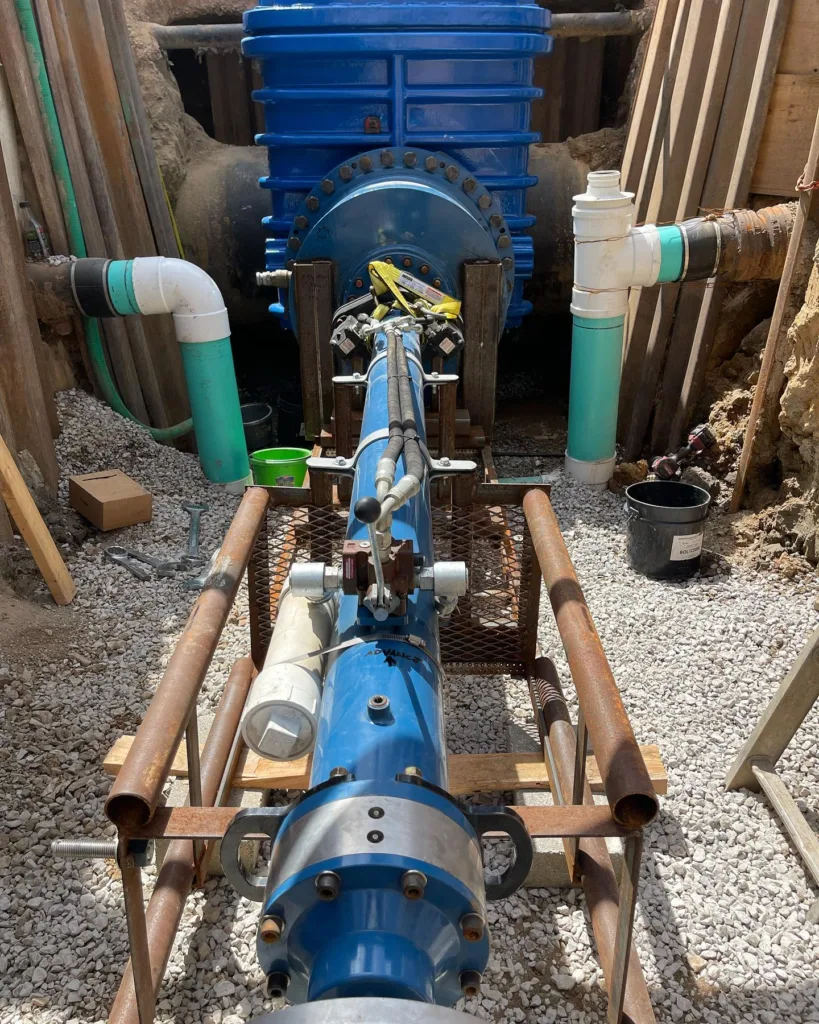 A hot tap service in motion. drilling out the pipeline section for the valve insertion.